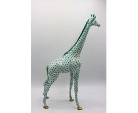 Tall green giraffe with fish scale design typical of Herend Hungary ceramics. Mark on bottom. Size:15 x 7 x 4 in.