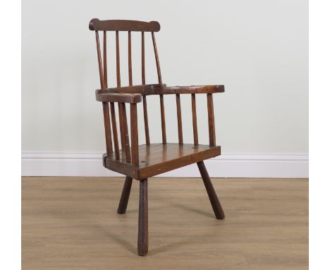 A GEORGE III ASH COMB BACK CHAIRWith pieced hoop back over three stake supports, 53cm wide; 98cm highTraces of old worm prese