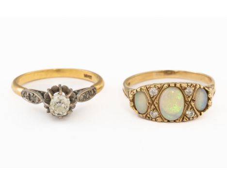 A GOLD AND DIAMOND SINGLE STONE RING  AND A 9CT GOLD, OPAL AND DIAMOND RING (2)The first claw set with a cushion shaped diamo