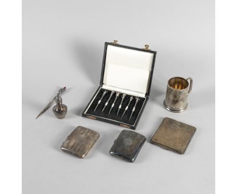 A VICTORIAN SILVER CHRISTENING MUG AND SIX FUTHER ITEMS (7)The christening mug, Birmingham probably 1883, three cigarette cas
