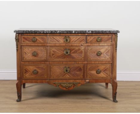 AN 19TH CENTURY FRENCH TRANSITIONAL STYLE BREAKFRONT MARBLE TOP COMMODEWith gilt metal mounted three drawer inlaid walnut bas