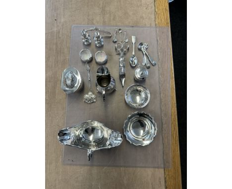 A SILVER TEA CADDYOf oval hinge lidded form, with partly fluted decoration, Sheffield probably 1910, weight 179 grams