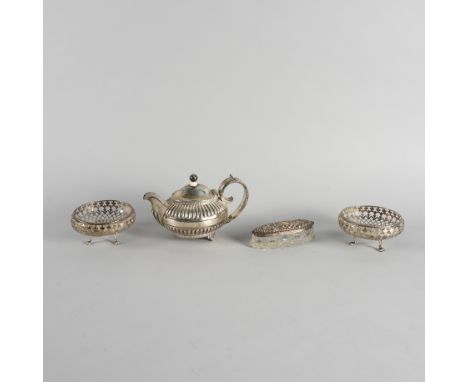 A GROUP OF SILVER AND SILVER MOUNTED WARES (4)Comprising; a small tea pot (one foot lacking), a pair of circular bonbon dishe
