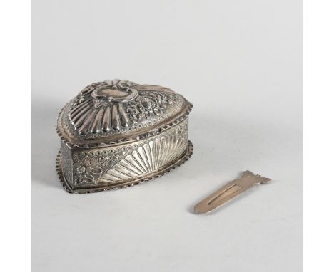 A SILVER HEART SHAPED BOX AND A SILVER BOOK MARKER (2)The heart shaped box with embossed decoration (damaged) London 1889, th