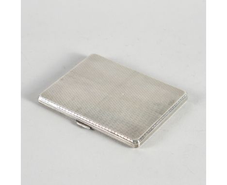 A SILVER CIGARETTE CASEEngine turned to the exterior and interior, Birmingham 1928, gross weight 145 grams, with an associate