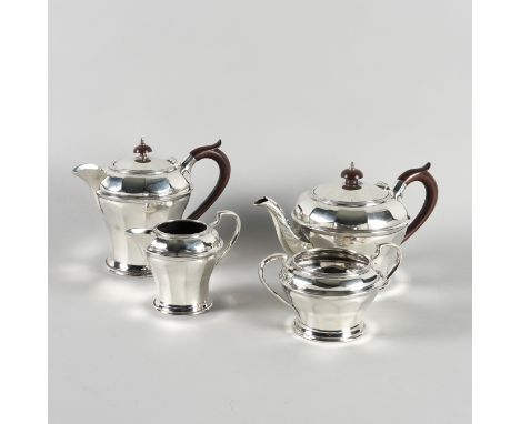 A SILVER FOUR PIECE TEA SET (4)Comprising; a teapot, a hot water jug, a twin handled sugar bowl and a milk jug, each piece of