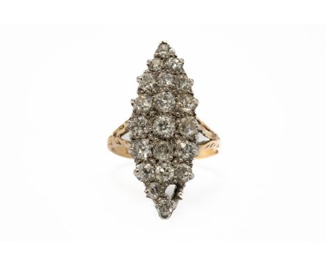 A GOLD AND DIAMOND MARQUISE SHAPED CLUSTER RINGMounted with old cut cushion shaped diamonds, (one diamond missing), detailed 