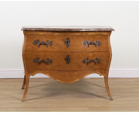 AN EARLY 19TH CENTURY ITALIAN COMMODEThe serpentine marble top over a parquetry inlaid walnut bombe two drawer base, 120cm wi
