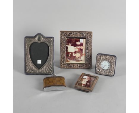 A GUCCI HIP FLASK AND FOUR FURTHER ITEMS (5)The hip flask with a box, a silver mounted strut clock, a photograph frame, havin