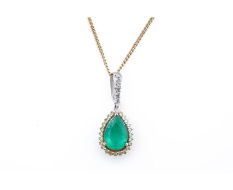 A WHITE GOLD, EMERALD AND DIAMOND DROP SHAPED PENDANT, WITH A GOLD NECKCHAIN (2)The pendant claw set with a pear shaped emera