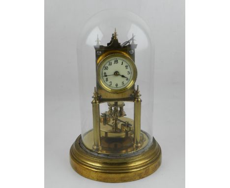 A late 19th / early 20th century Gustav Becker brass anniversary clock, the enamel dial with Arabic numerals and outer minute