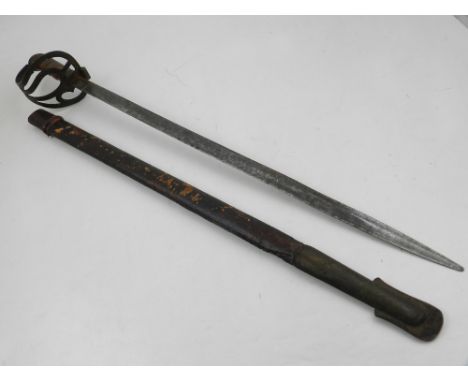 A 19th century short sword, with a pierced brass basket hilt, in a brown leather scabbard, L. 51cm. 