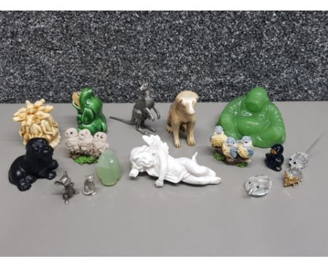 A jade style buddha and bird together with other animal ornaments including Swarovski and pewter
