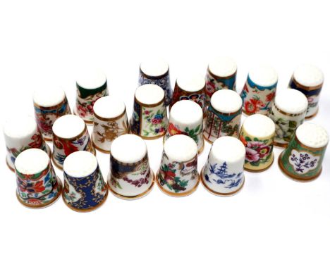 Twenty one mixed Royal Worcester ceramic thimbles. P&amp;P Group 2 (£18+VAT for the first lot and £3+VAT for subsequent lots)