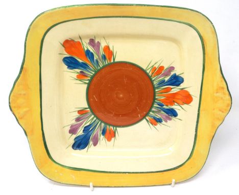 Clarice Cliff Bizarre dish in the Crocus pattern, D: 28 cm, surface scratches and wear to paint. P&amp;P Group 1 (£14+VAT for