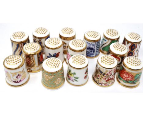 Fifteen Royal Crown Derby ceramic thimbles. P&amp;P Group 2 (£18+VAT for the first lot and £3+VAT for subsequent lots) 