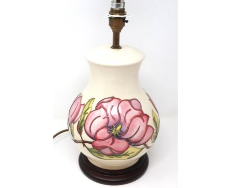 Moorcroft table lamp in the Magnolia pattern, with shade, overall H: 57 cm, crazing throughout. P&amp;P Group 3 (£25+VAT for 