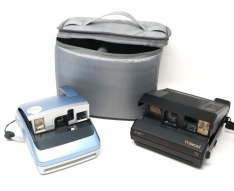 Two Polaroid folding cameras, a 600 and an Image 2, with carry case, working at lotting. P&amp;P Group 2 (£18+VAT for the fir