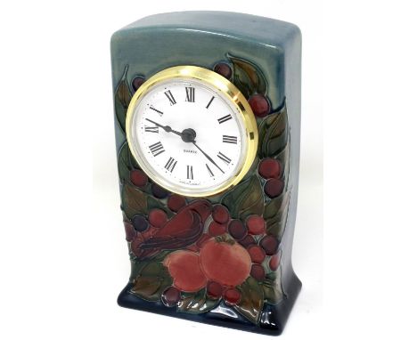 Moorcroft quartz mantle clock decorated with birds and berries, H: 15 cm, not working at lotting, heavy crazing throughout. P