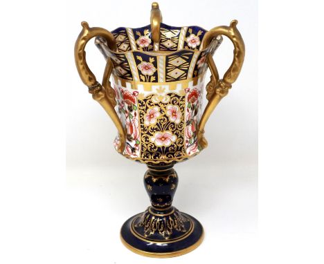 Royal Crown Derby tri-handled urn vase in the Imari pattern, H: 22 cm, with damages. P&amp;P Group 1 (£14+VAT for the first l