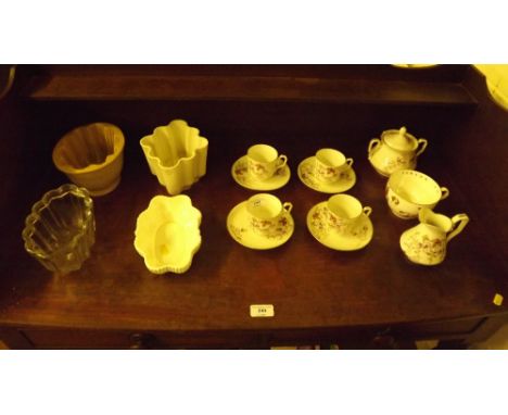 Three various jelly moulds; a Coalport dish; a quantity of floral decorated teaware and a Royal Worcester cup depicting hunti
