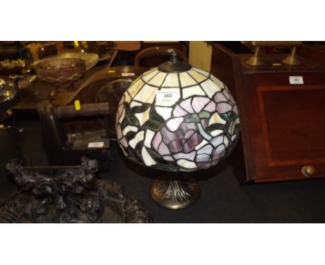 A Tiffany style table lamp and shade