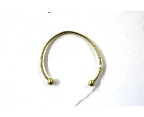 A 9ct gold bangle