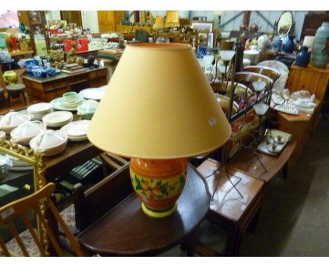 A crackle glazed table lamp and shade with floral decoration