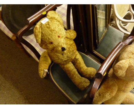 A collection of four well loved Vintage Teddy bears, some in need of attention