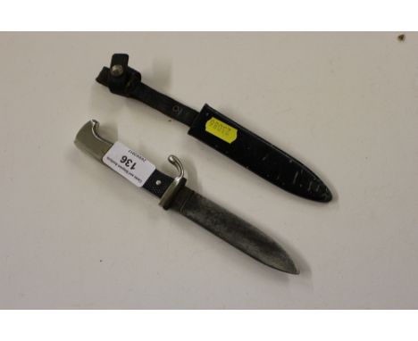 A German dagger with scabbard