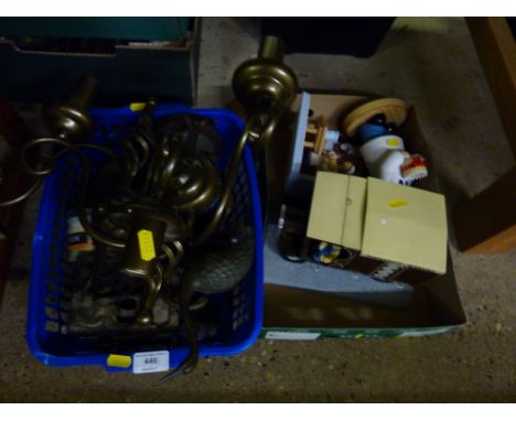 A box containing light fittings and a box of figures
