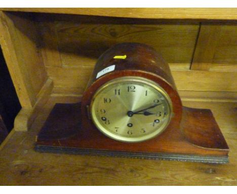 A mahogany cased three hole mantel clock 