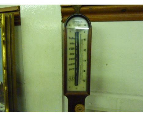 A mahogany cased ships stick barometer and thermometer by Sewells of Liverpool 