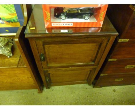 An Edwardian mahogany and inlaid commode
