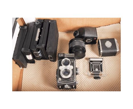  Medium Format accessories, including a Vivitar MC 2X Converter for Hasselblad 6x6, a Yashica-Mat LM camera and more