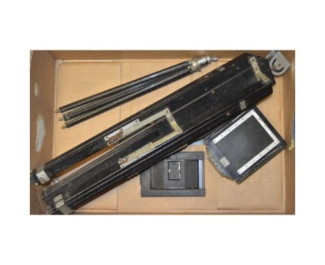 A Gandolfi Wooden Tripod, black,missing tripod head, together with one other, a Goerz 1/4 plate extension back with DDS and m
