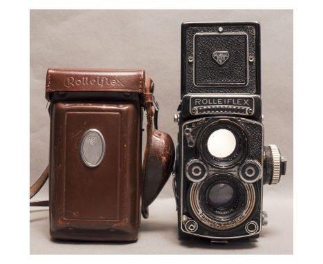 A Rolleiflex 35F TLR Camera, with Zeiss Planar 75mm f/3.5 lens in original maker's leather case