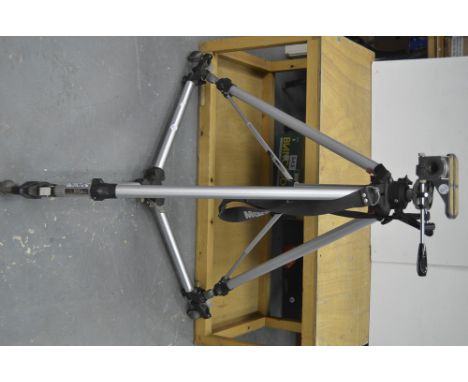 Manfrotto Heavy Duty Tripod, a model #058 together with a Gitzo PL5 tilt and pan tripod head and a Manfrotto wheeled Auto Dol