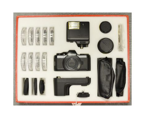 Pentax auto 110 SLR System Presentation Set, a full outfit, seemingly unused and in maker's packaging, including lens, filter