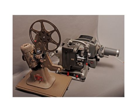 8mm Film Projectors, Gaumont model 606 together with spare lens, film spool, 500W Atlas projector bulb and instruction manual