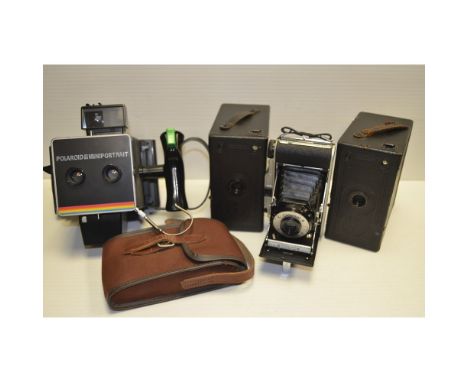 A Tray of Cameras,  Two Ensign J-B box cameras, a Coronet folding camera and a Polaroid Mini Portrait