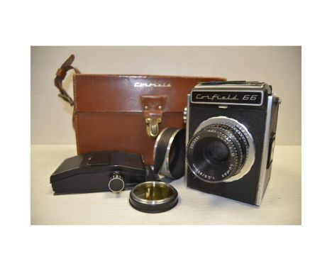 A Corfield 66 SLR Camera,  with a Lumax 95mm f/3.5 lens an additional roll film back in maker's leather case, reportedly only