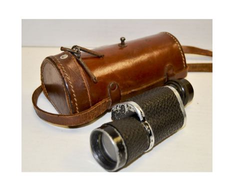 A Broadhurst Monocular,  10x32, some covering peeling off, in original maker's leather case