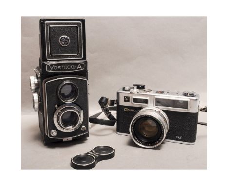 A Pair of Yashica Cameras, a Yashica-A TLR Camera with Yashimar 80mm f3.5 in original leather case together with a Yashica El