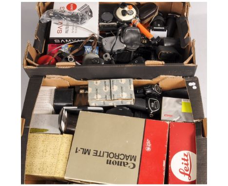 Two Trays of Camera accessories, including a Canon Macrolite ML-1, Nikon pistol grips, bellows and much more