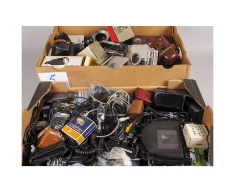 Various Camera Accessories,  including filters, lens hoods, flash and sync equipment, lens cases and more