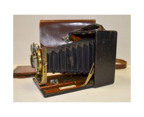 Early Folding Camera,  a Lizars Challenge quarter plate camera, Dallmeyer lens, B&L shutter, one DDS, leather case