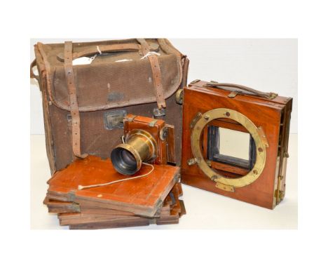 A Thornton Pickard Imperial Triple Extension Field Camera Body, together with Inst/Time shutter mechanism, brass lens and fou