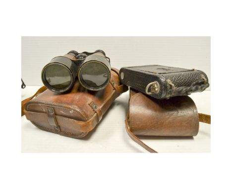 French Field Glasses,  by A. Tubeuf, with government broad arrow mark, in maker's leather case together with a Kodak No.1 Jr 