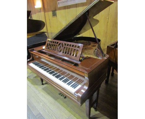 August ForsterA grand piano in a mahogany case on dual square tapered legs. AMENDMENT Is (c1917) and is an 88-note 6ft Model 